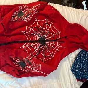 Red zip up jacket from SHEIN WITH SPIDER WEB PRINT